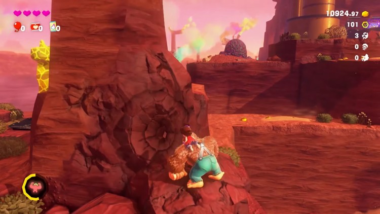 Donkey Kong Bananza smashing a stone column