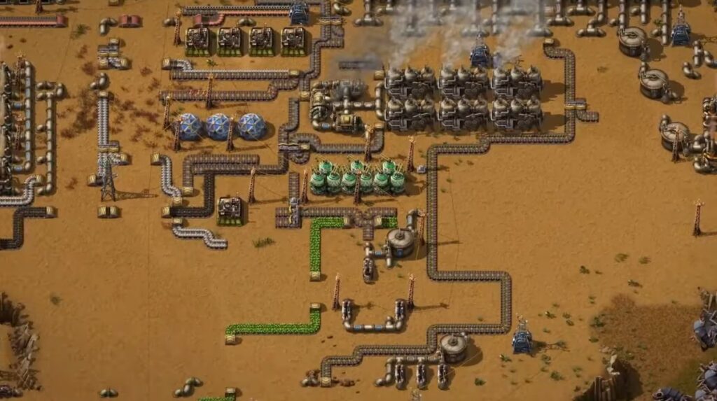 Factorio multiplayer gameplay with players building an automated factory together