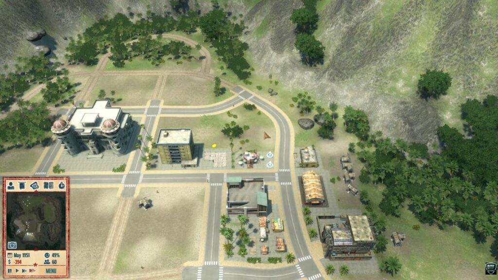 Tropico 4 island city with roads, buildings and tropical landscape